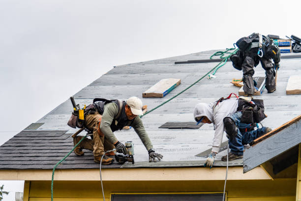 Professional Gutter Installation technician working in Montchanin, DE